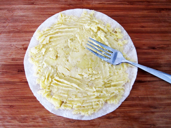 Mashed potatoes on tortilla